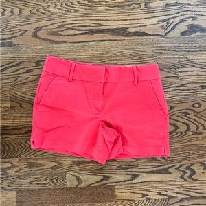 Loft Riviera bright sunset orange/red color size 4 with 4” inseam. NWT